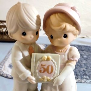 Precious Moments to remember,50th wedding Anniversary figurine.In good condition